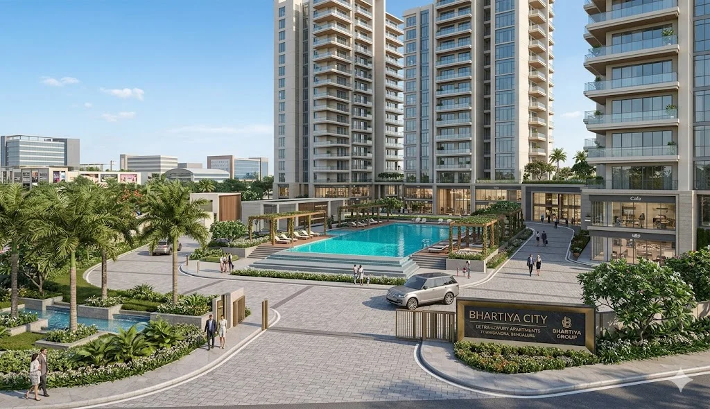 Exterior view of modern luxury apartments located in Thanisandra, North Bangalore, offering quick access to Manyata Tech Park and the Outer Ring Road.